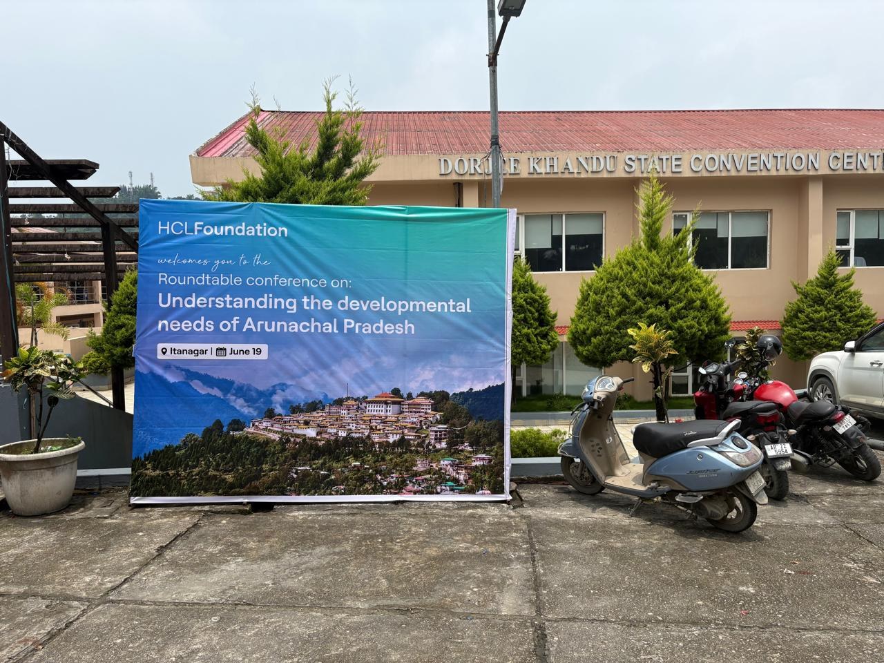 HCLFoundation roundtable banner outside DK Convention Hall
